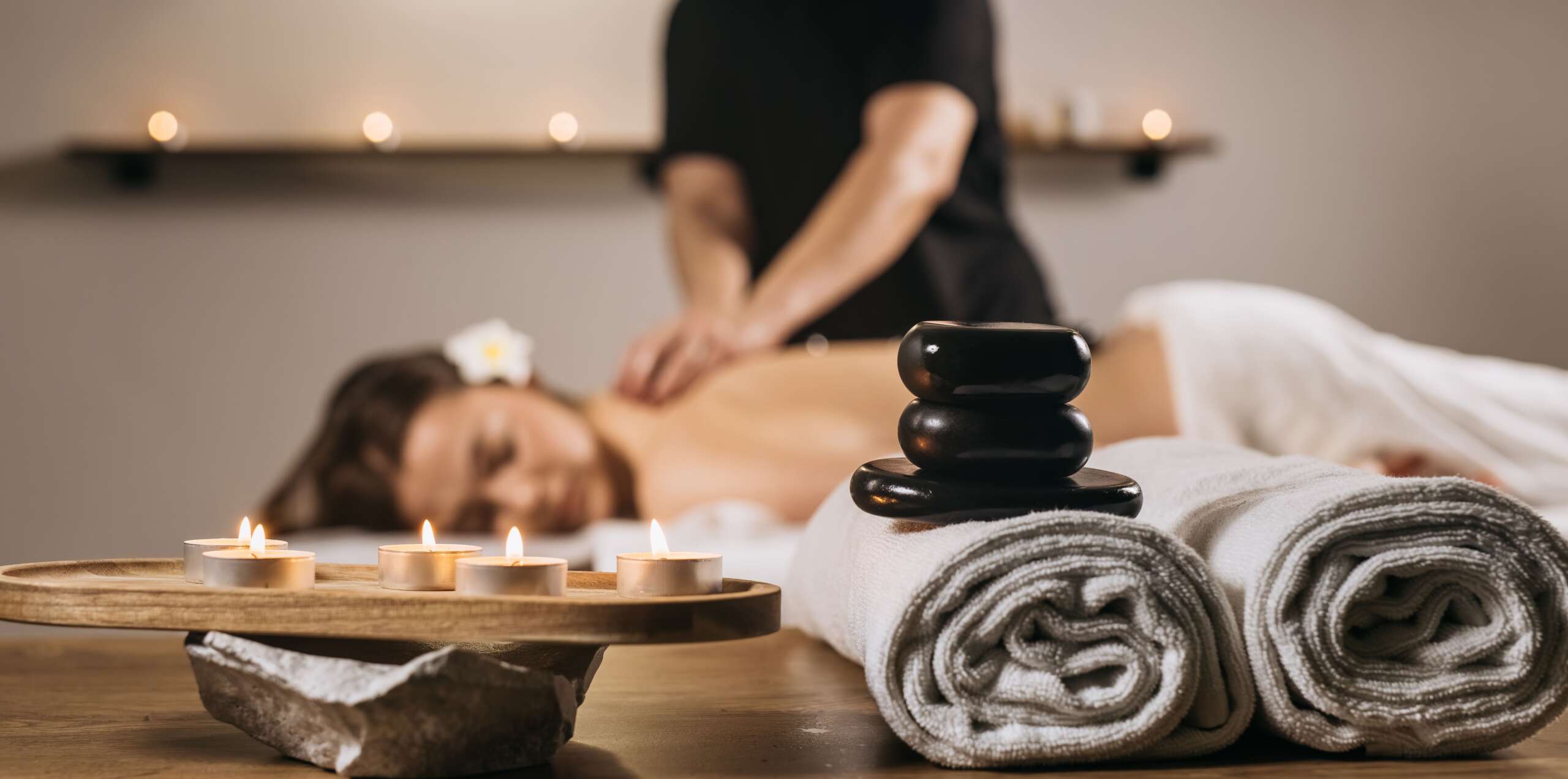 vecteezy_relaxing-spa-scene-with-a-woman-receiving-a-soothing_75350633 (1)